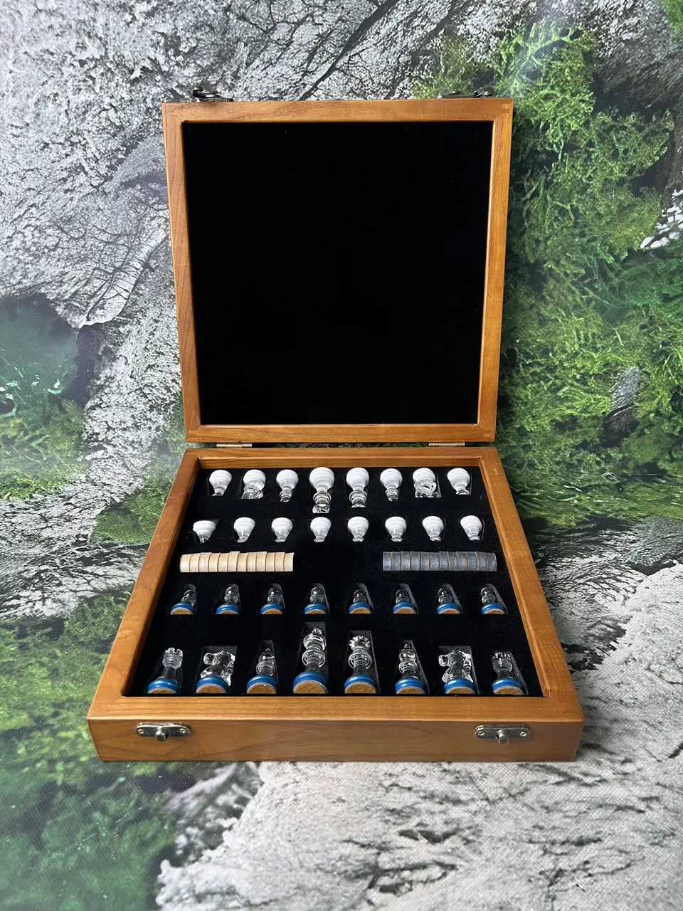 Handcrafted glass chess set with dark artistic design