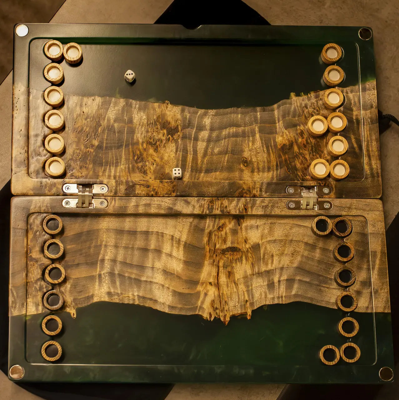 Open green epoxy wooden backgammon board with natural wood grain