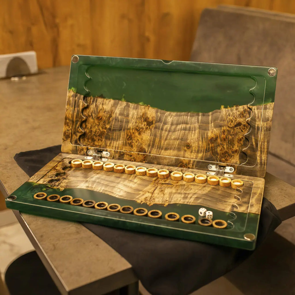 Handcrafted wooden backgammon board with green epoxy sections