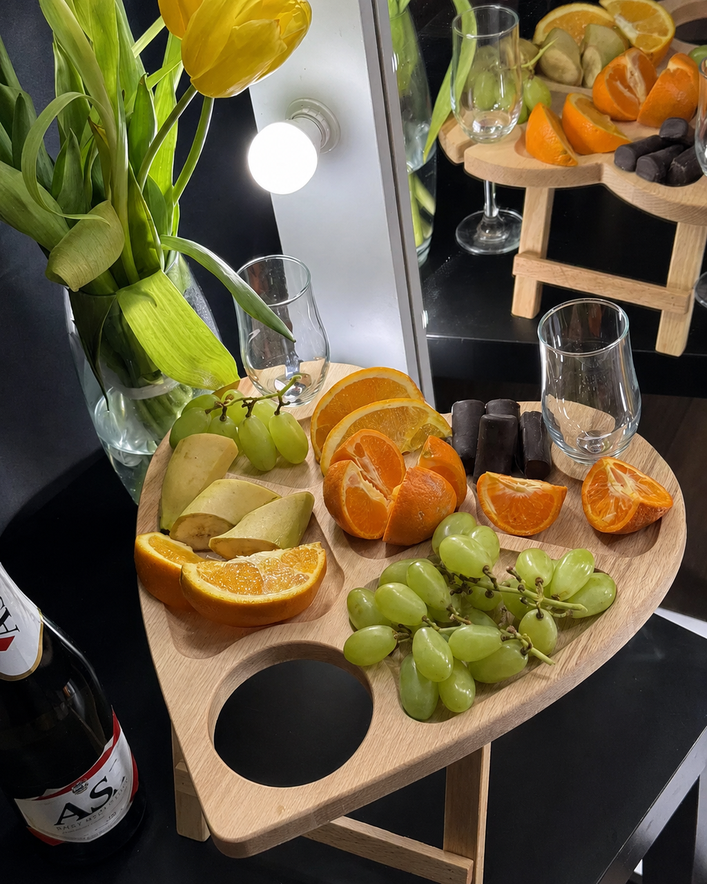 Handmade heart-shaped charcuterie serving board with folding legs