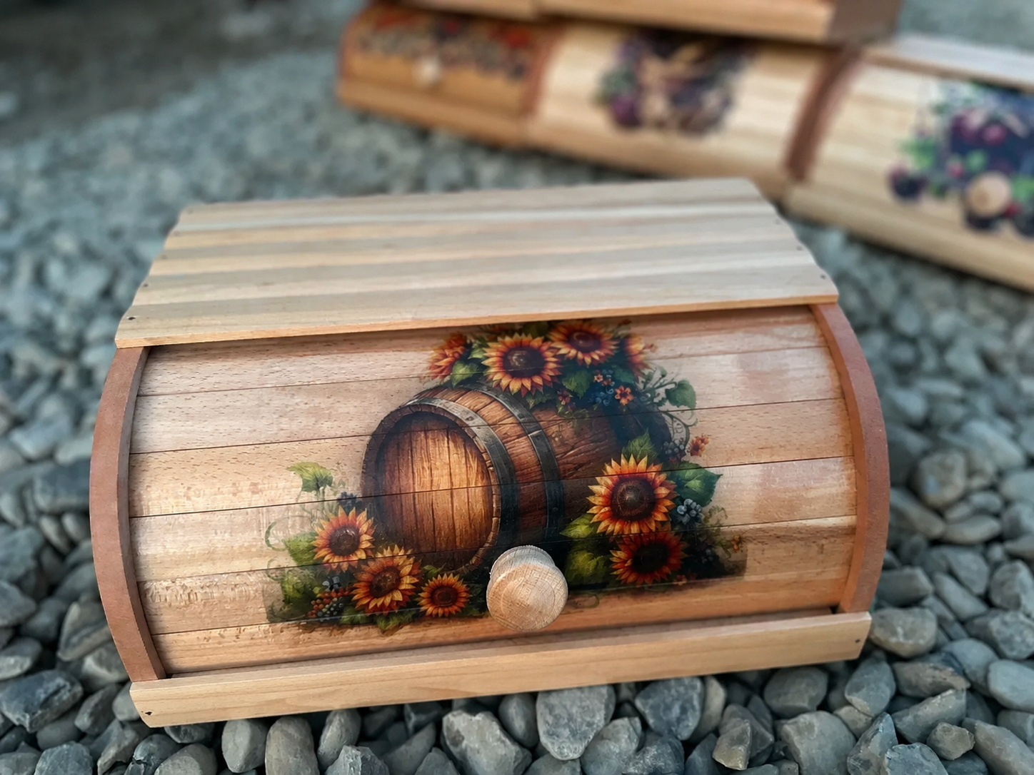 Handcrafted wooden bread box with sunflower and barrel artwork made from natural beech wood