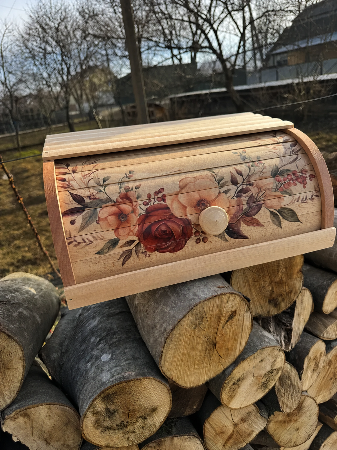 Decorative floral bread storage box with roll-top lid for farmhouse kitchen