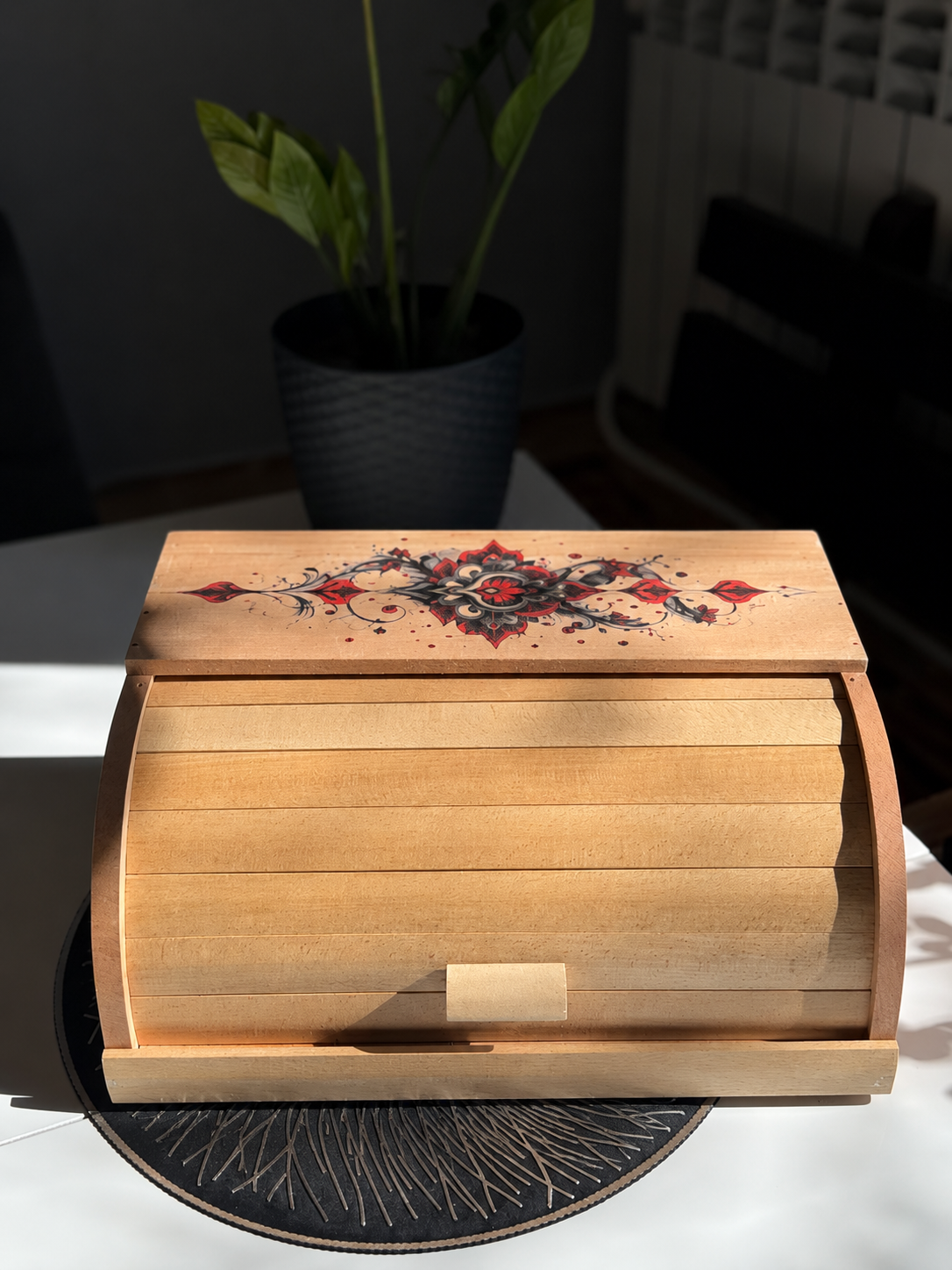 Wooden bread box with decorative ornament design