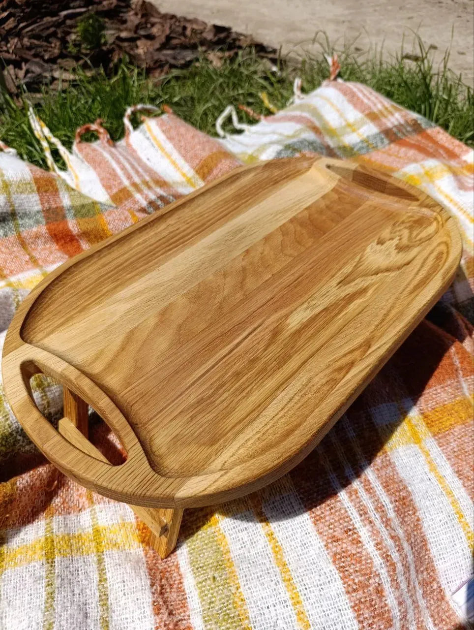 Handmade oak serving table with minimalist design
