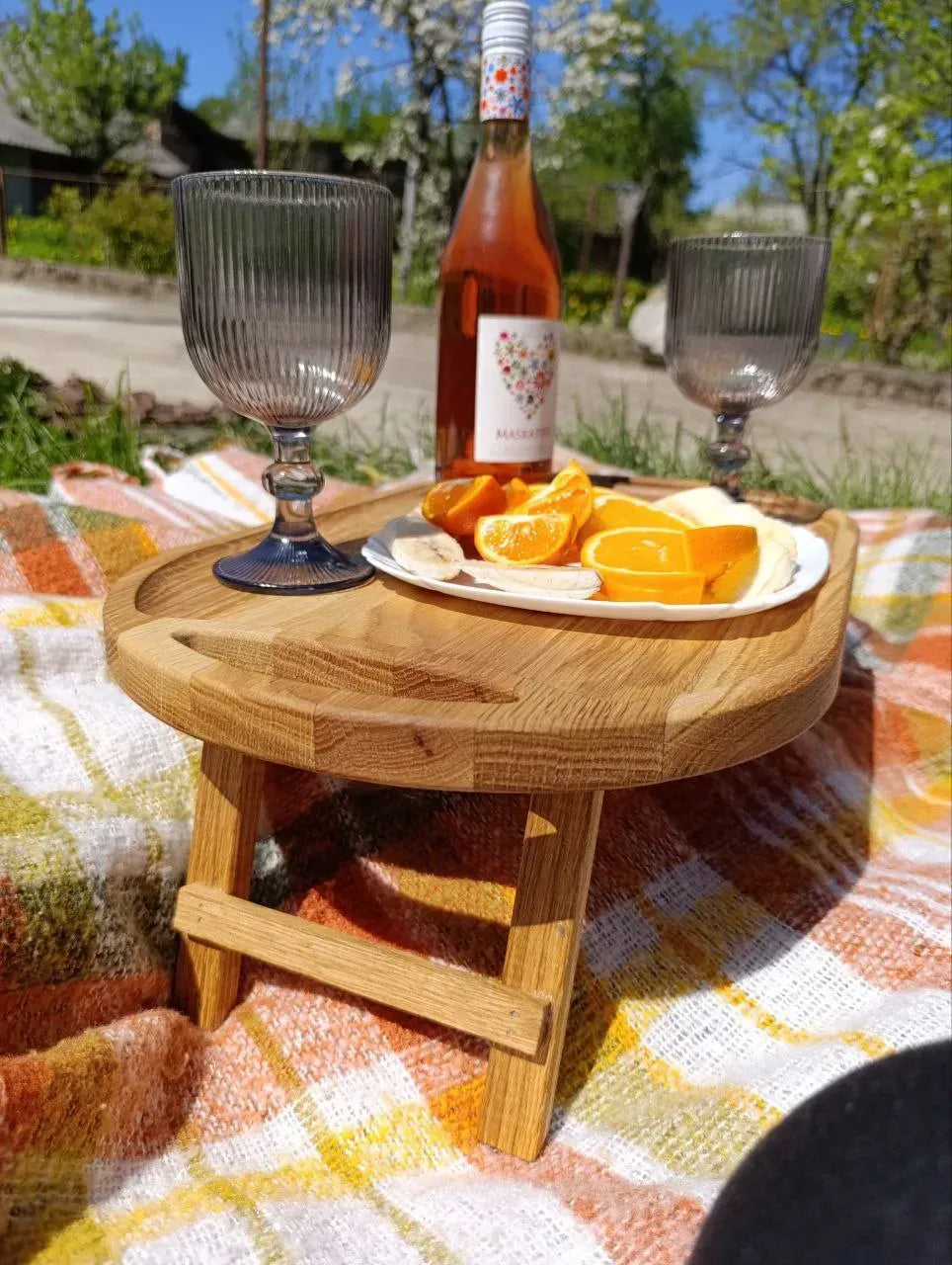Solid oak table used for wine and fruit serving outdoors