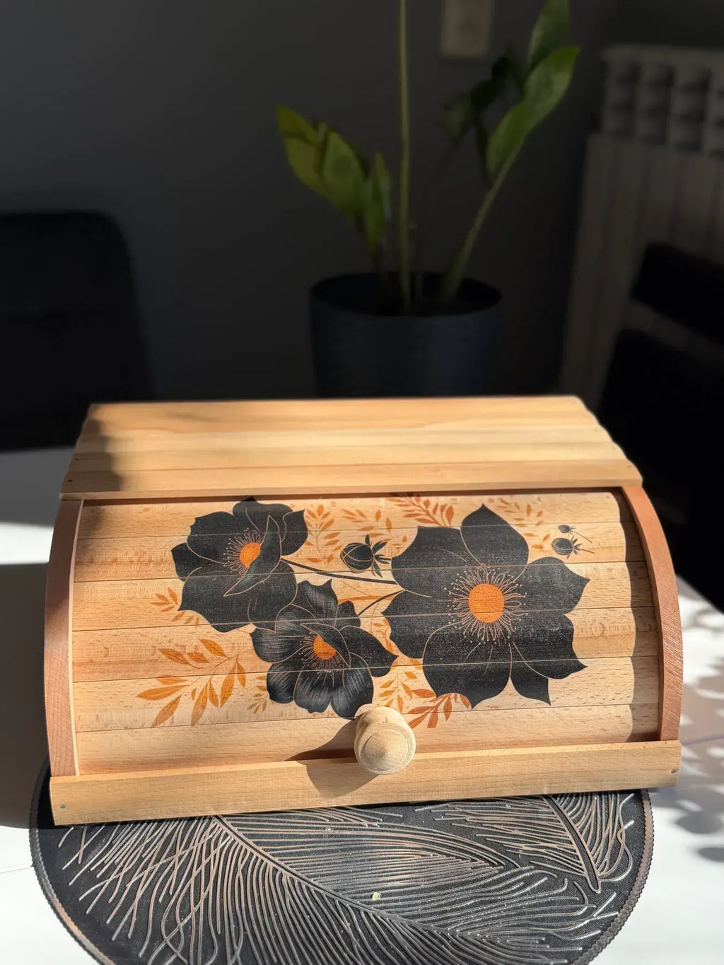 Wooden bread box with floral decorative design