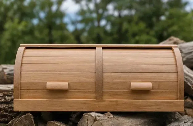 Natural beech wood double bread box displayed outdoors on wooden logs