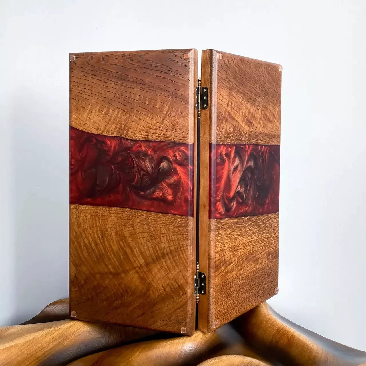Closed wooden backgammon set with red epoxy resin stripe, natural wood grain handmade board