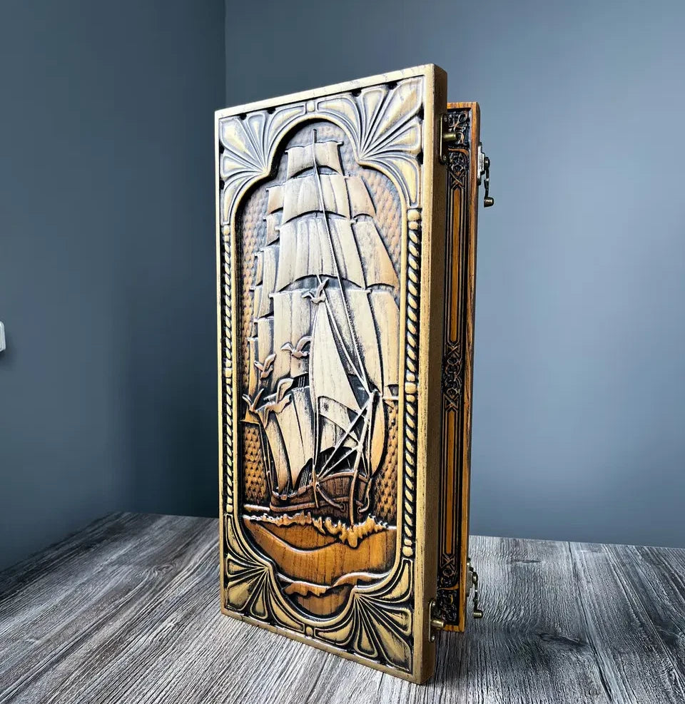 Premium engraved backgammon board featuring a tall ship design carved from solid wood