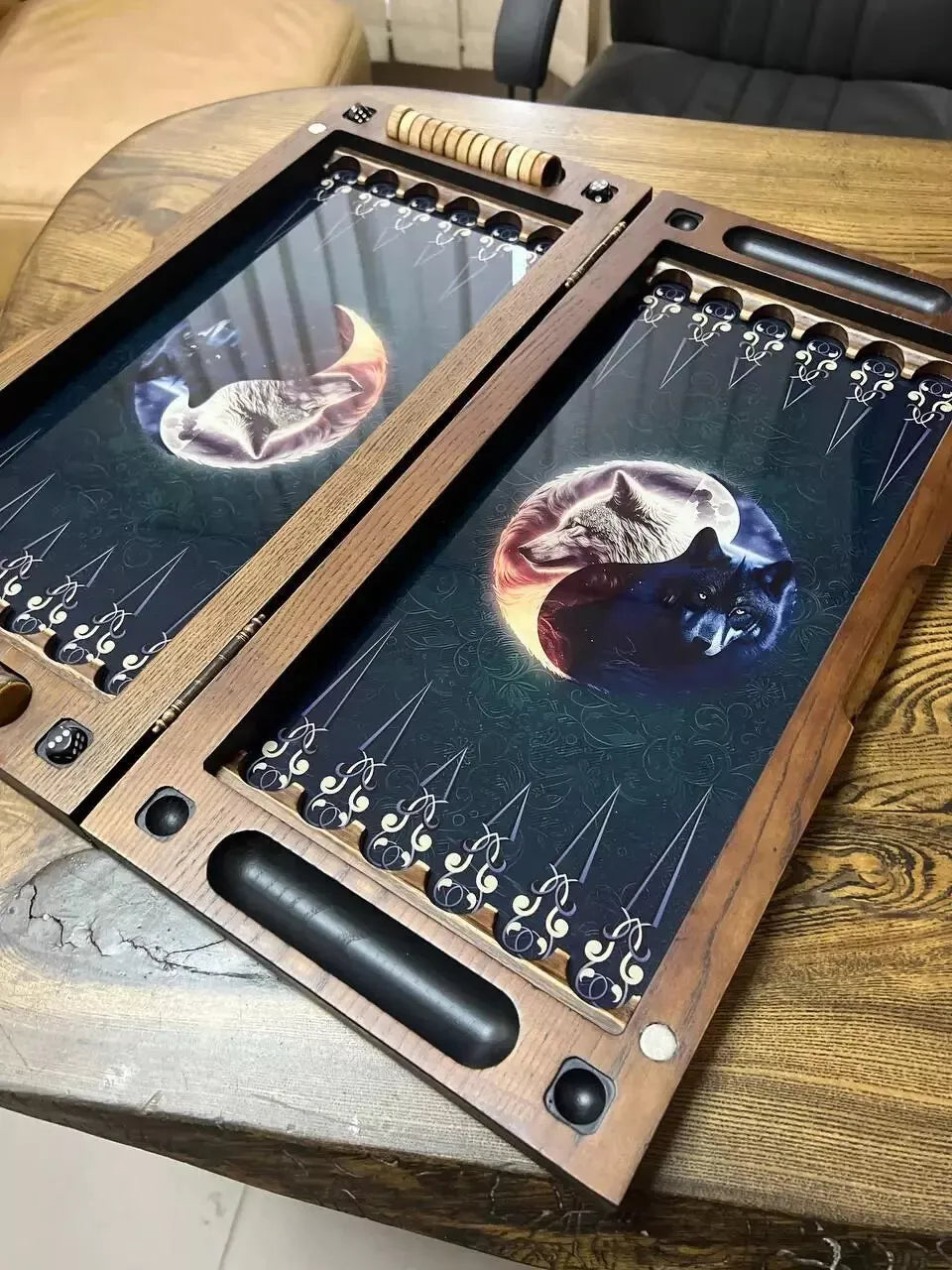 Open wooden backgammon set with wolf yin yang illustration, handcrafted frame, storage compartments, and premium finish