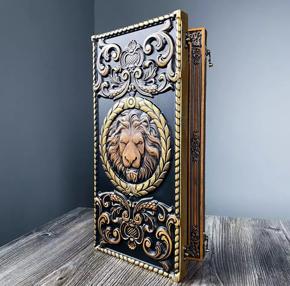 Carved wooden backgammon case with 3D lion head design and ornate decorative patterns, standing upright.