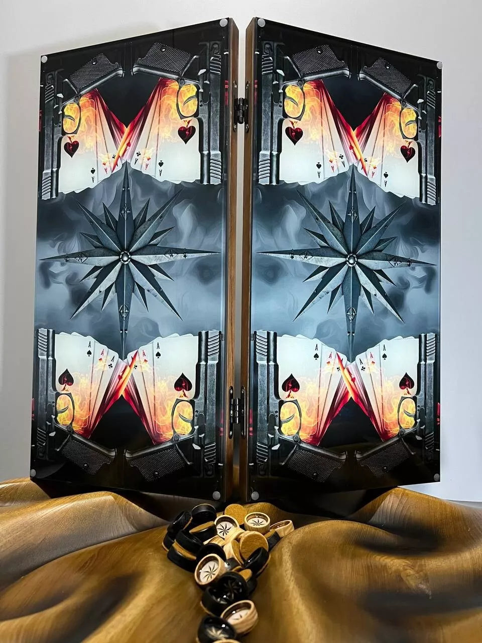 Handmade wooden backgammon set with playing cards and weapons artwork, closed luxury board game