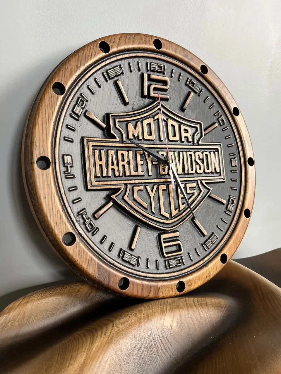 Motorcycle themed wooden wall clock with carved emblem, round rustic clock with dark face and wood frame