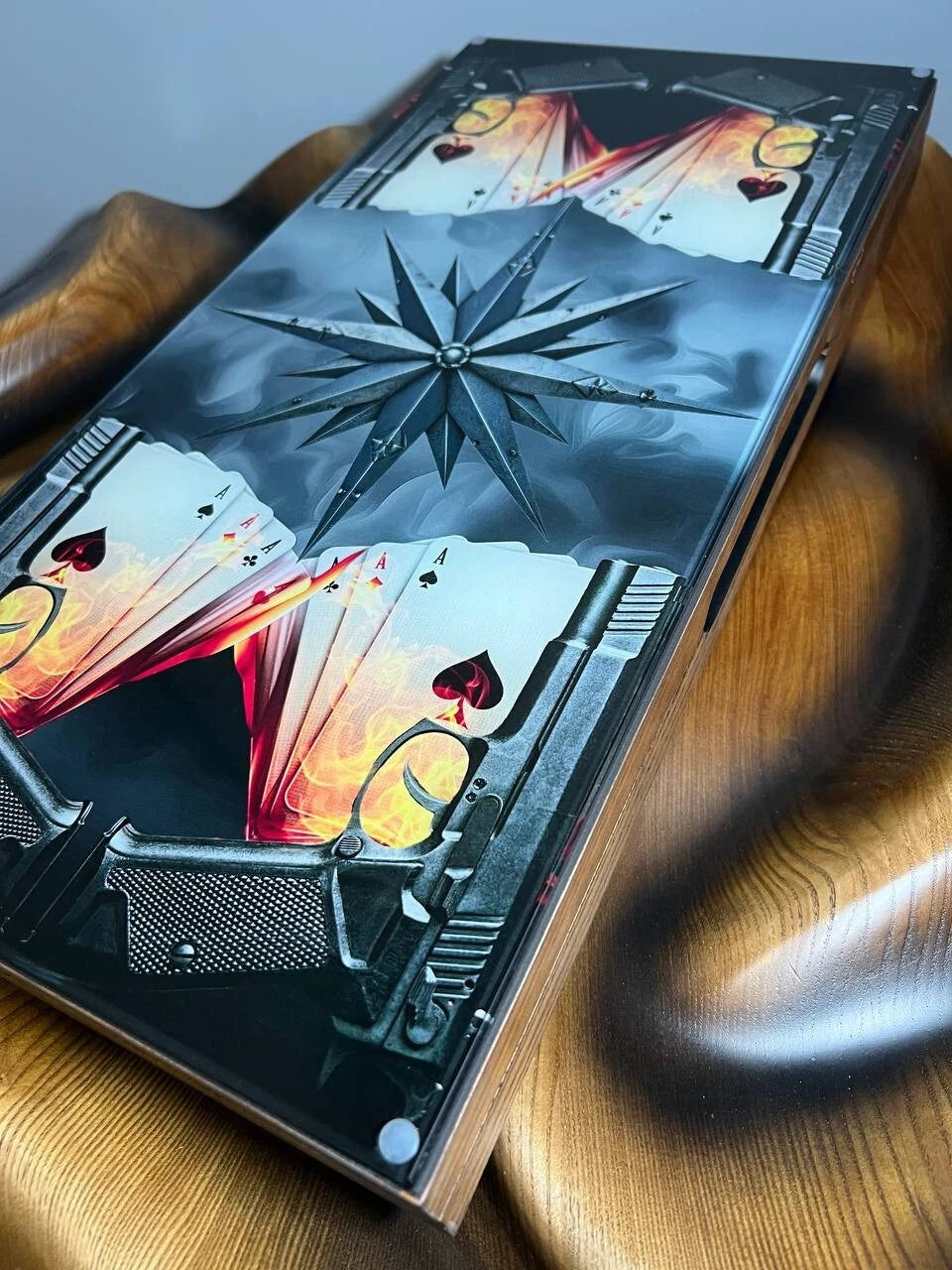Handmade wooden backgammon set with playing cards and gun design, closed luxury board game