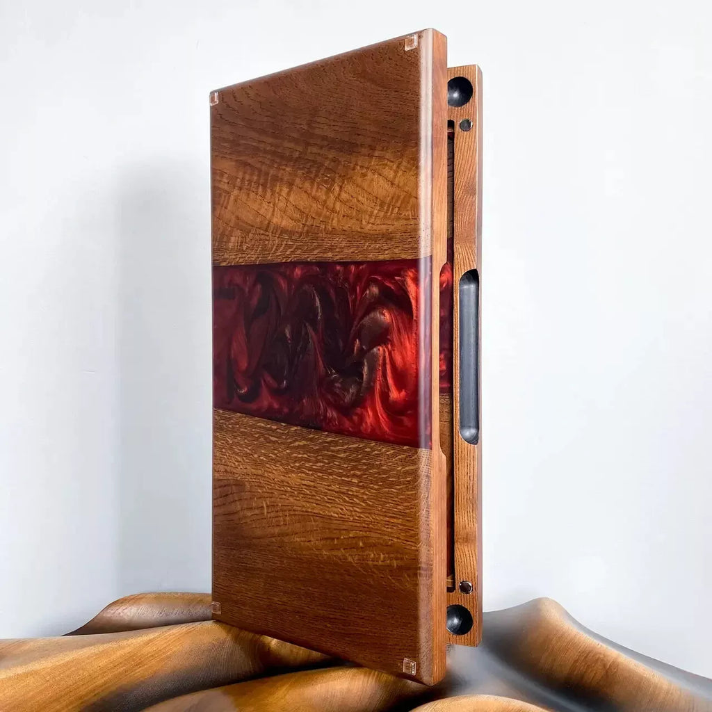 Vertical view of wooden backgammon board featuring red epoxy resin accent and premium craftsmanship