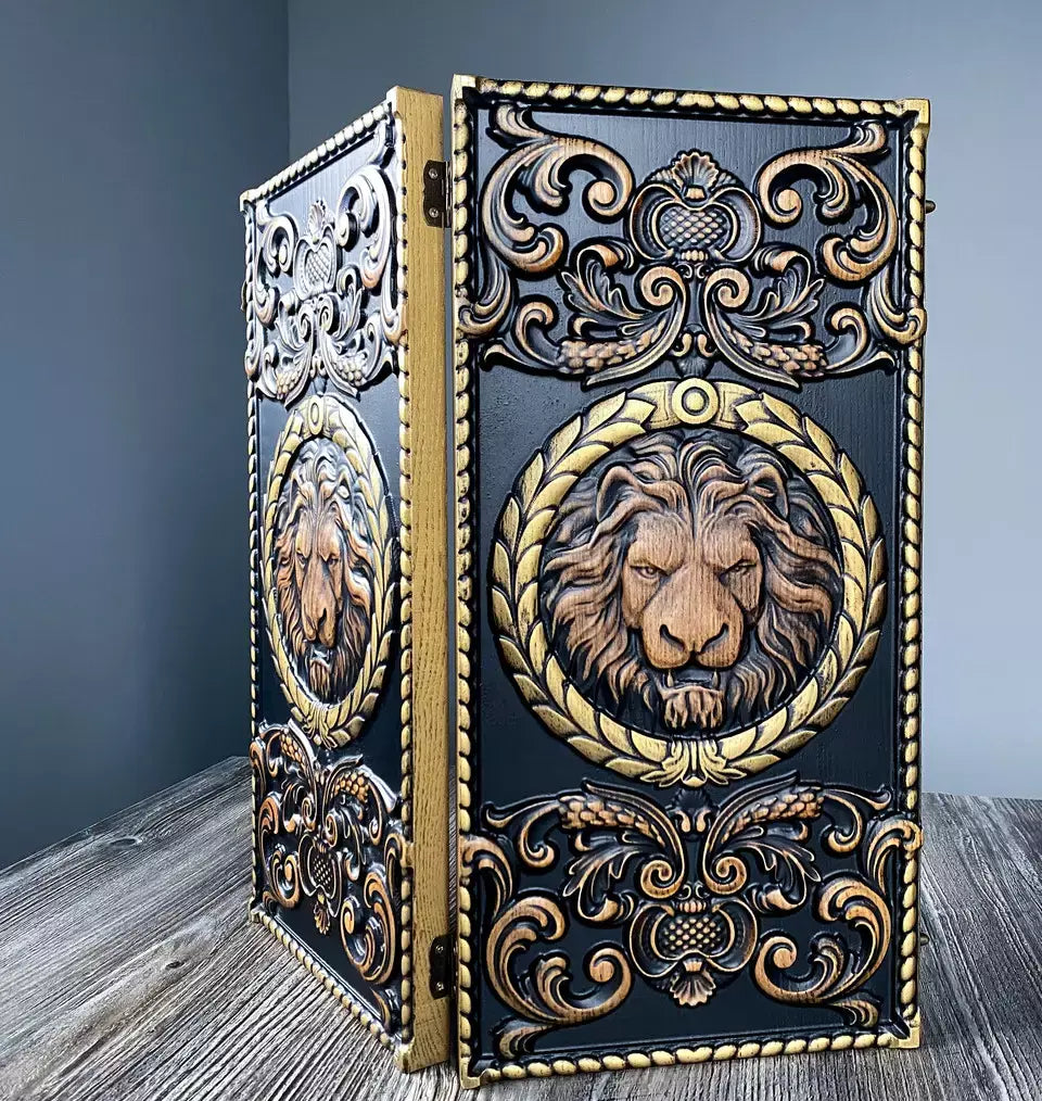 Hand-carved wooden backgammon case featuring a detailed lion head design and ornate decorative patterns.