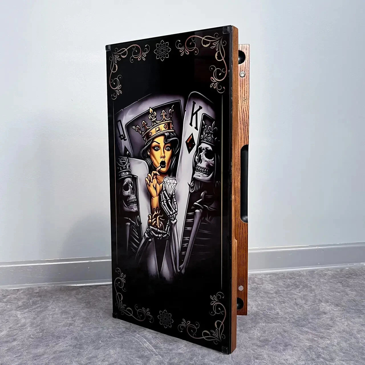 Luxury wooden backgammon set with tempered glass, Kings and Queens playing cards artwork, side view of handcrafted board