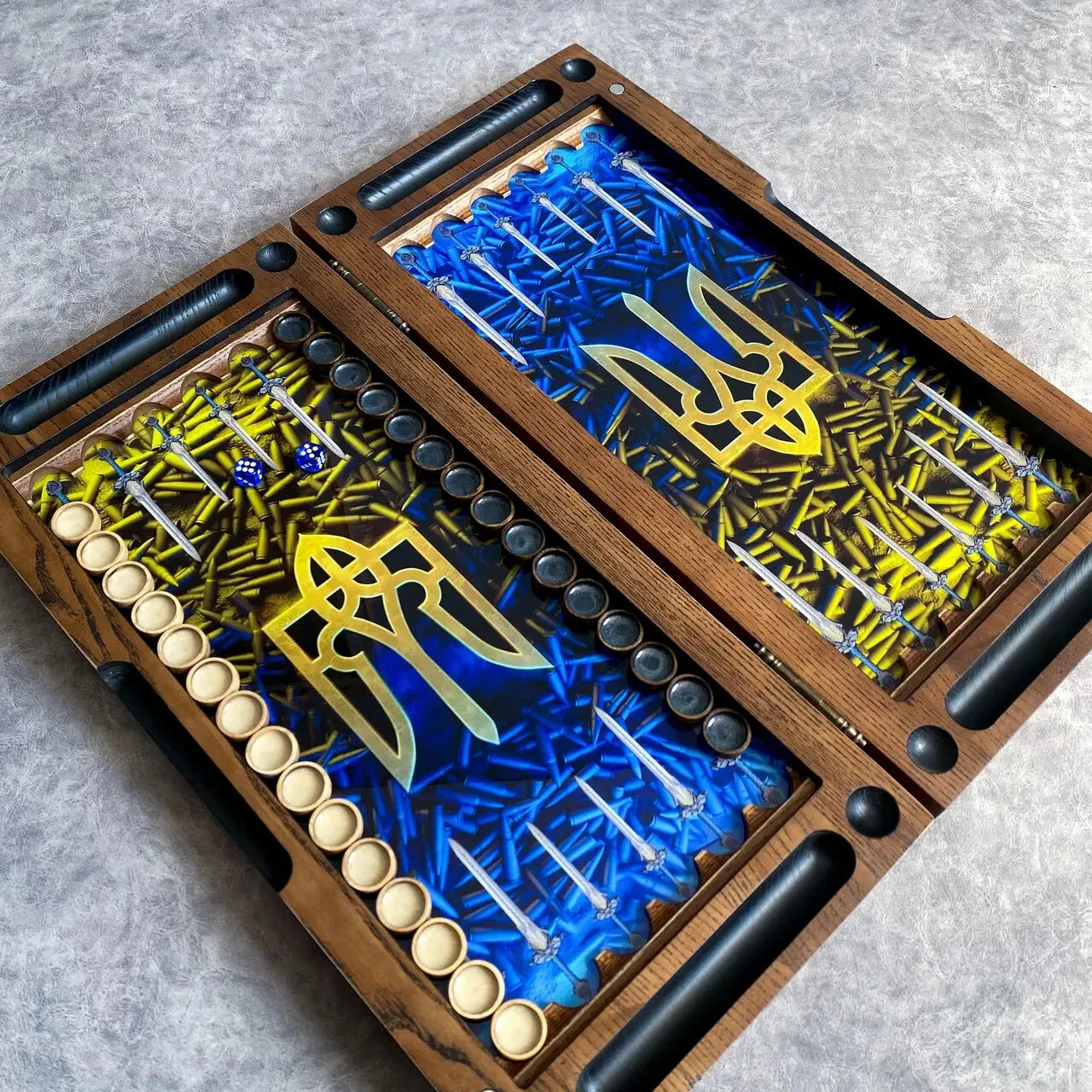 Artistic backgammon board inspired by Ukraine, featuring trident emblem, blue and yellow tones, and unique bullet-style design